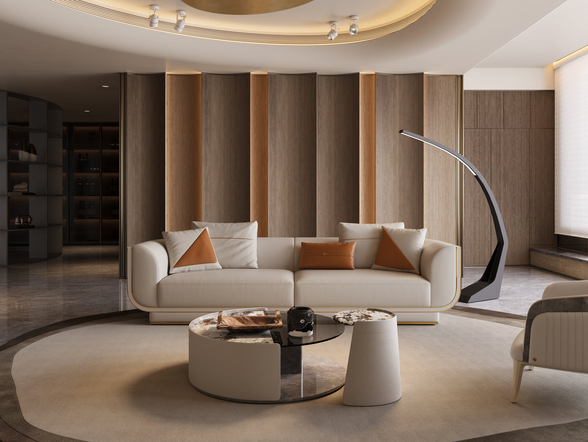 Front view of the luxury custom Mirelano Ripley Sofa in a modern living room with a marble background.
