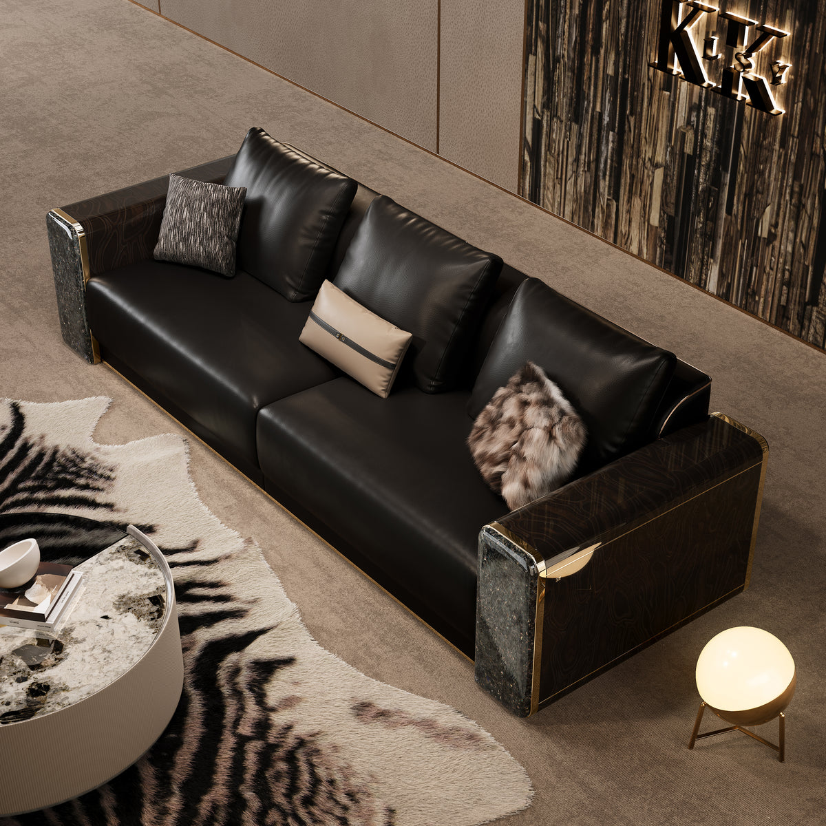 High angle top view of the light luxury black leather Mirelano Nares Sofa, styled with a zebra print rug.