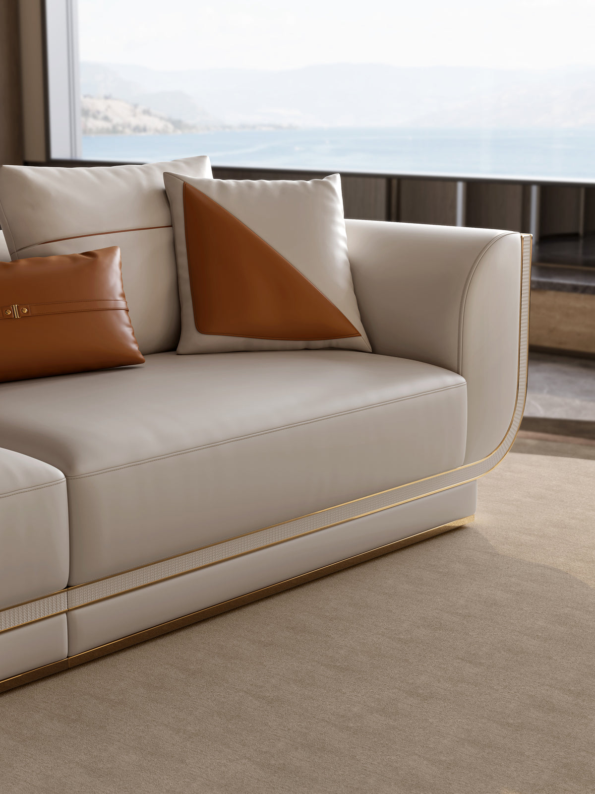 Close-up detail of the light luxury Mirelano Ripley Sofa, showcasing the premium leather armrest and contrasting throw pillows.
