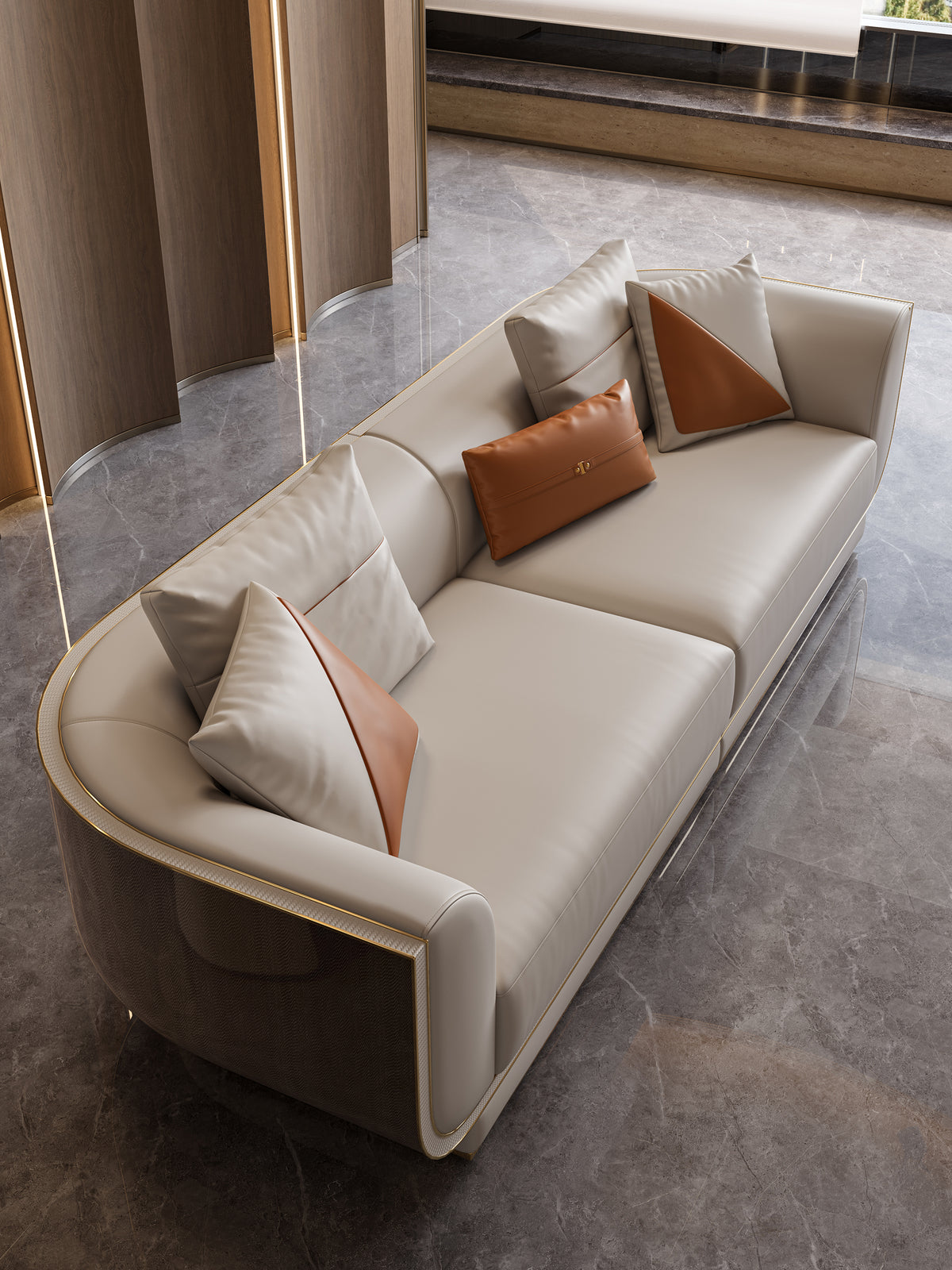 High angle view of the premium custom Mirelano Ripley sofa, highlighting its smooth curved lines and leather upholstery.
